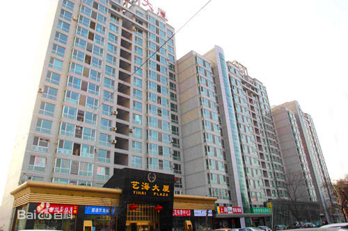 也是另一群默默无名的人的"大日子"——在康定路艺海大厦20,21层楼中